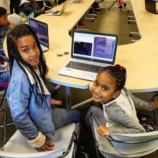 Two Girls Coding