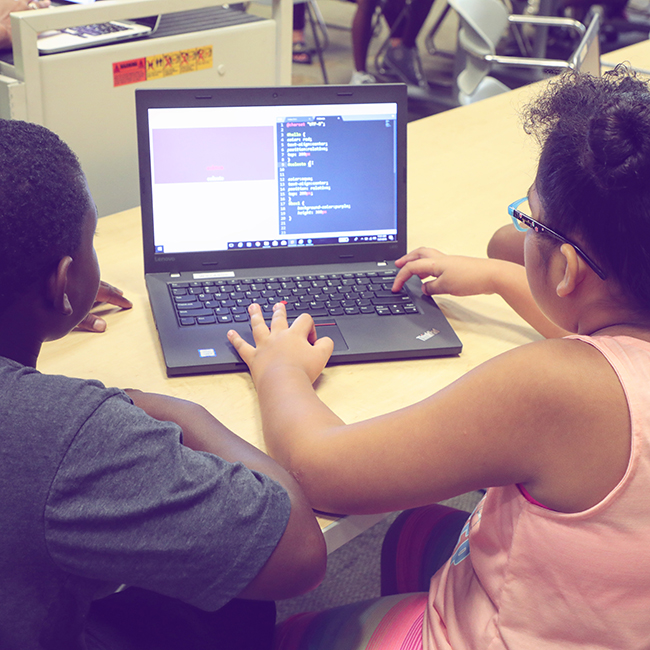 Boy and girl coding